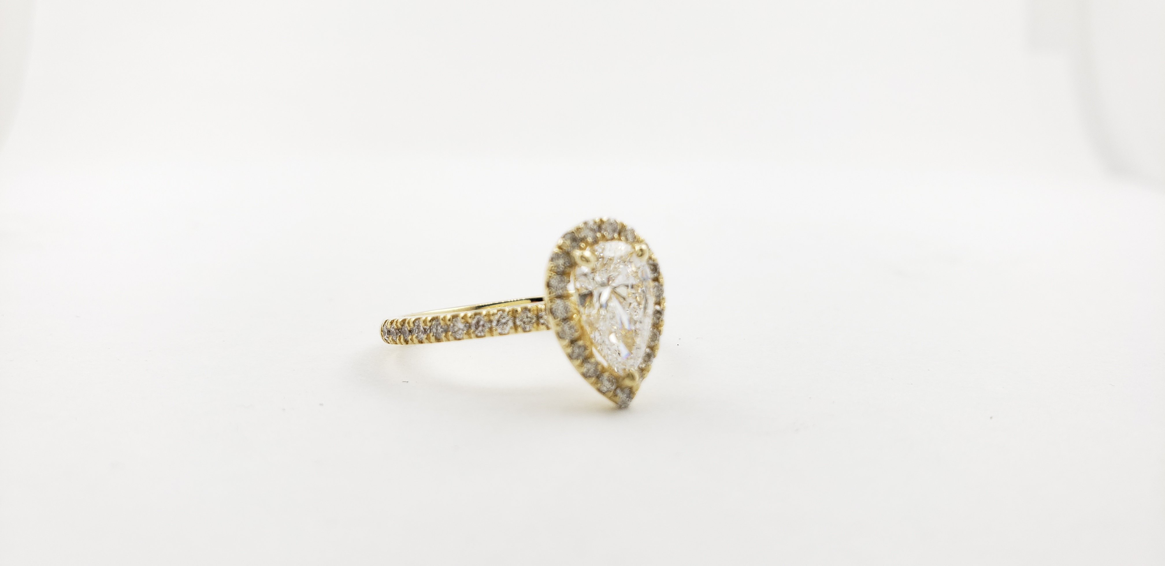 Pear Shape Diamond Ring with Halo